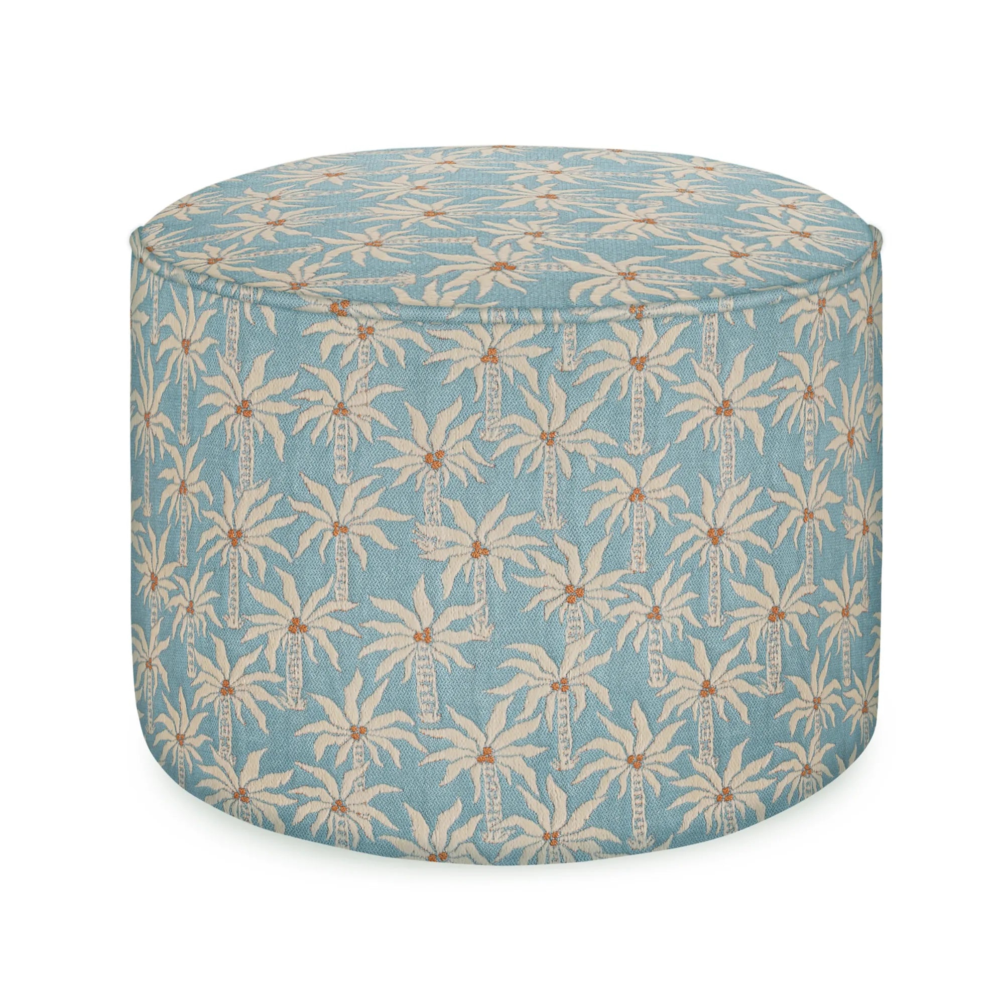 Laura Pouf in a cozy living room setting with a matching sofa