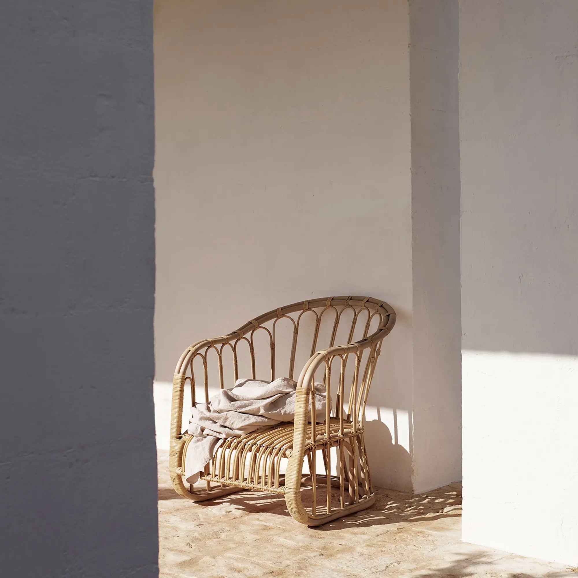 Pair of stylish and comfortable rattan chairs for outdoor seating