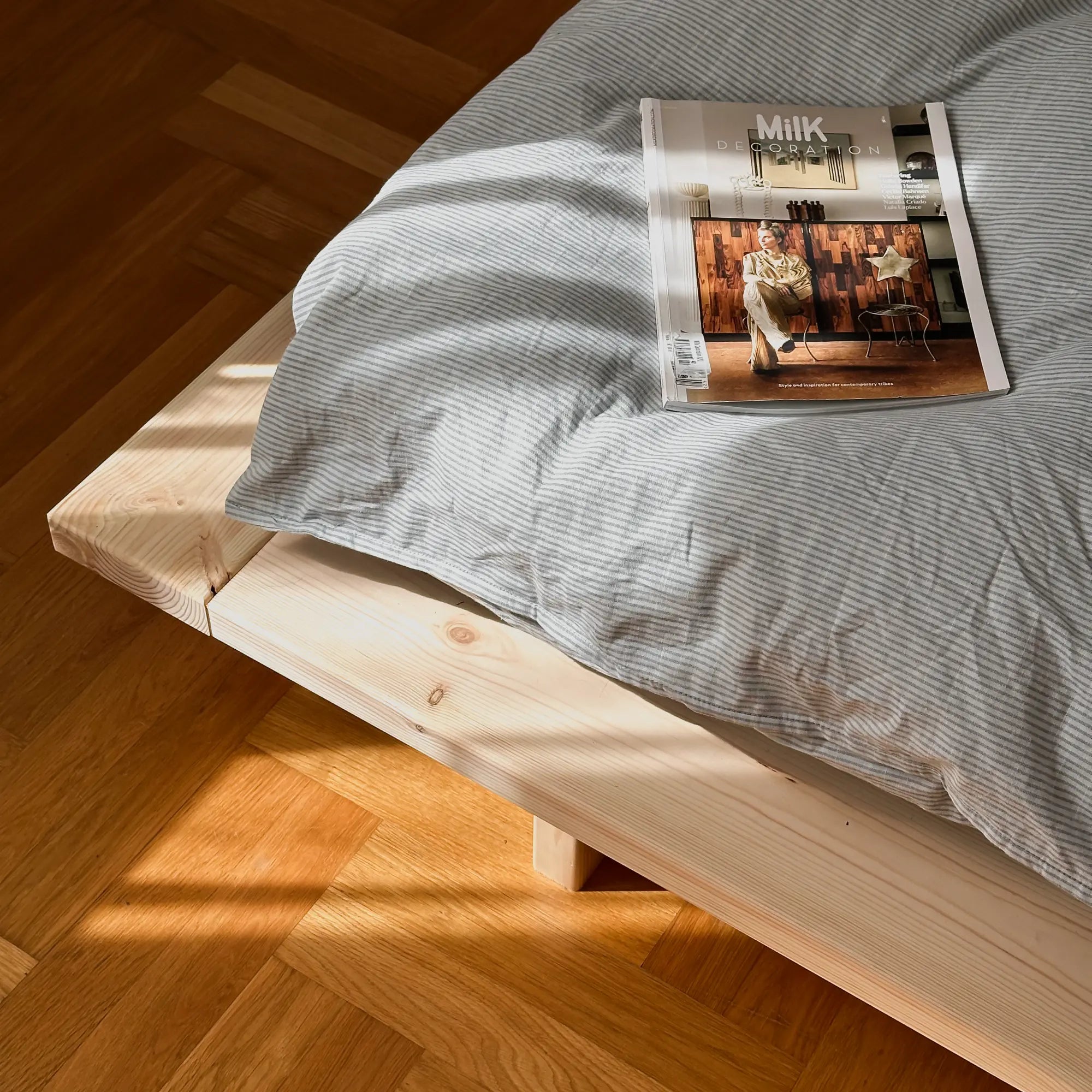 Handcrafted raw Japan bed made from natural wood with modern design