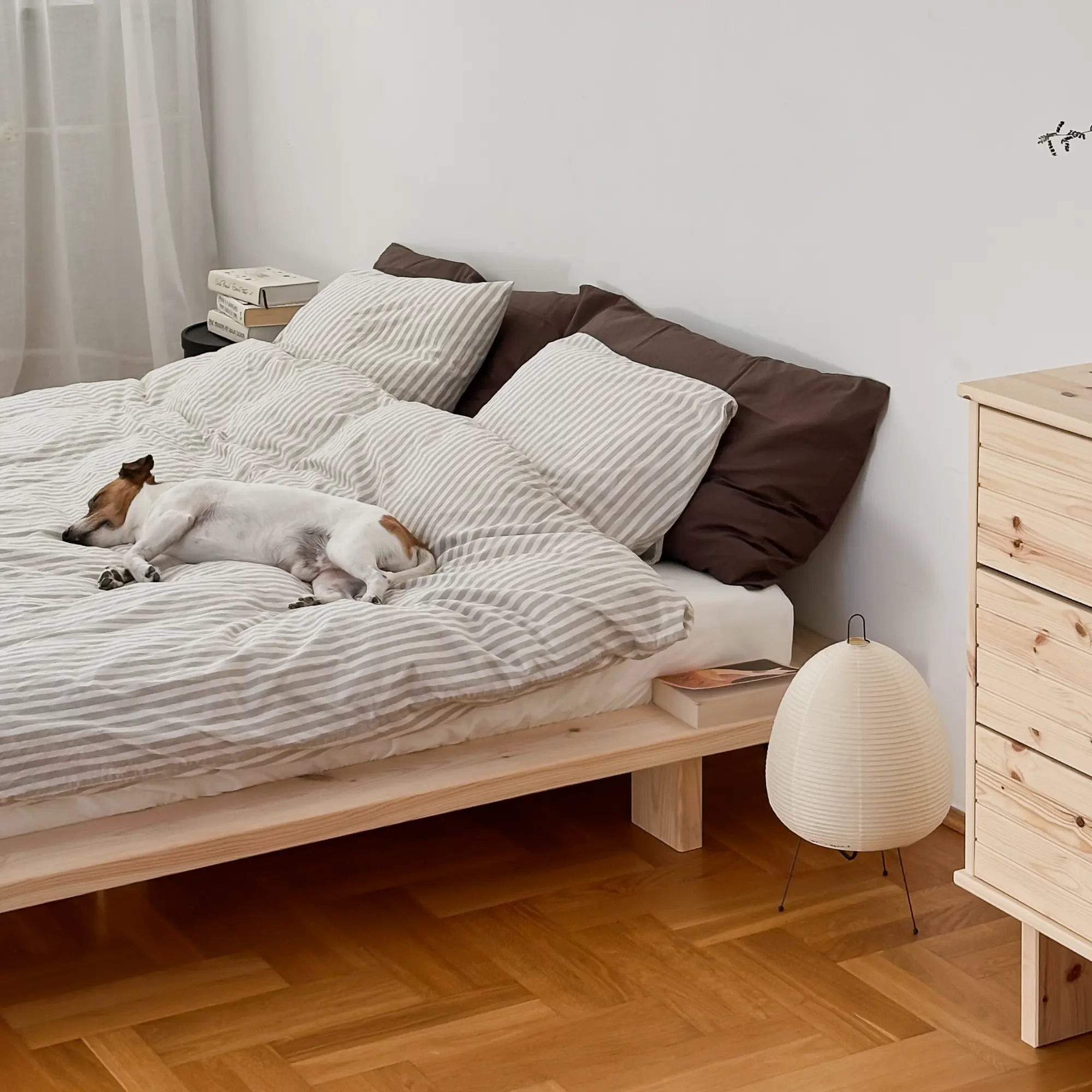 Handcrafted raw Japan bed made from natural wood with minimalist design