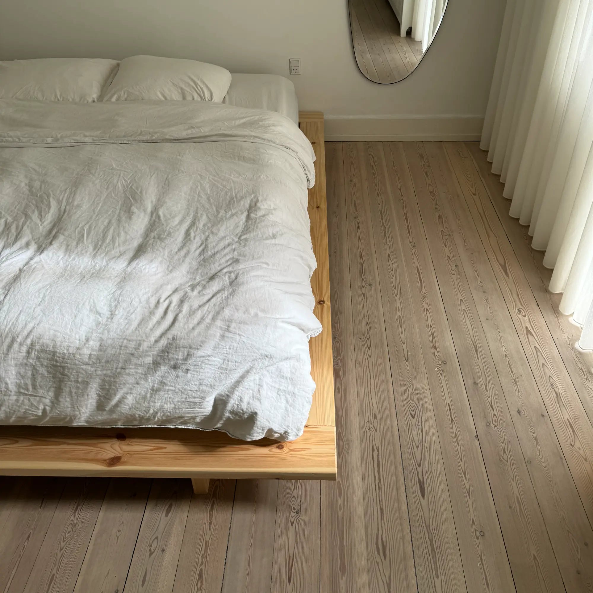 Handcrafted Japan Bed made from raw, untreated wood, with clean, minimalist design