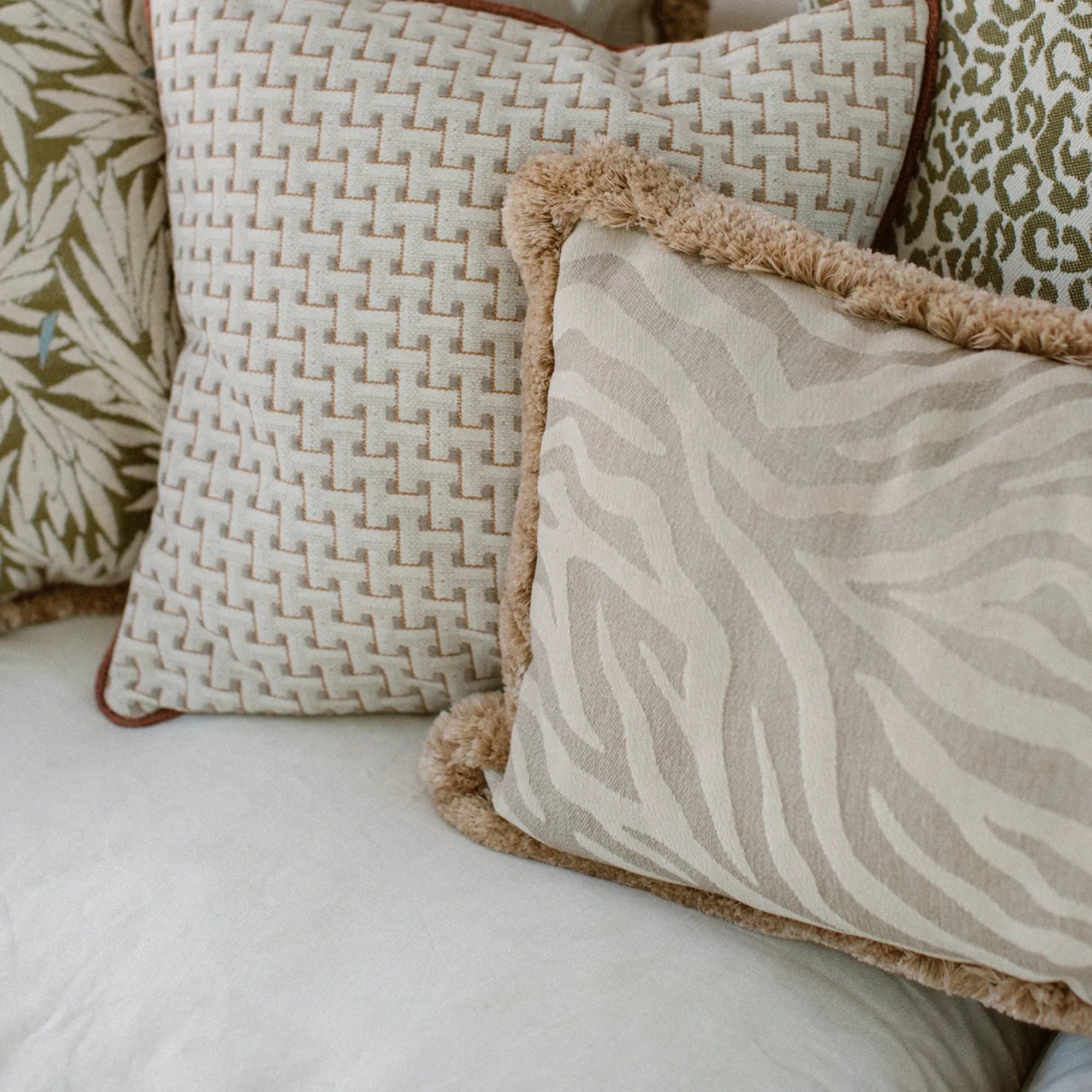 Amina Cushion with Frills in a modern living room, complementing the existing furniture and decor