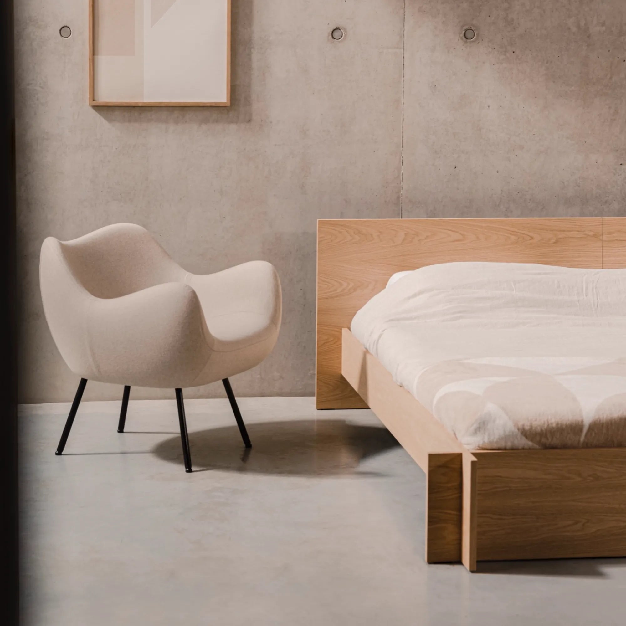 Valt Bed with customizable fabric options and modern, minimalist aesthetic
