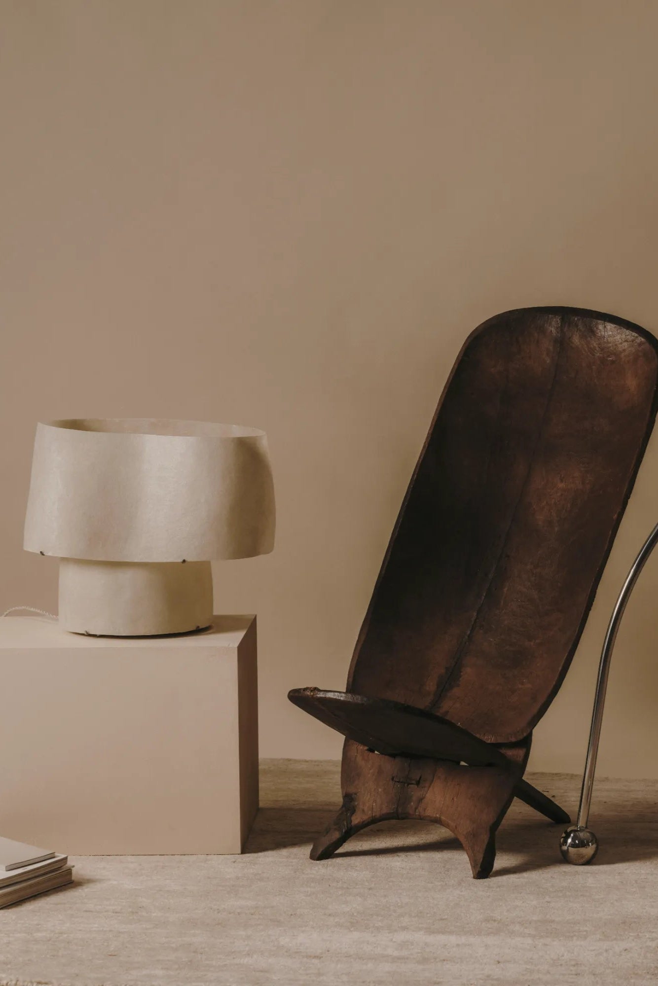The intricate craftsmanship of “Mush” Lamp (Chub) on display in a minimalist bedroom