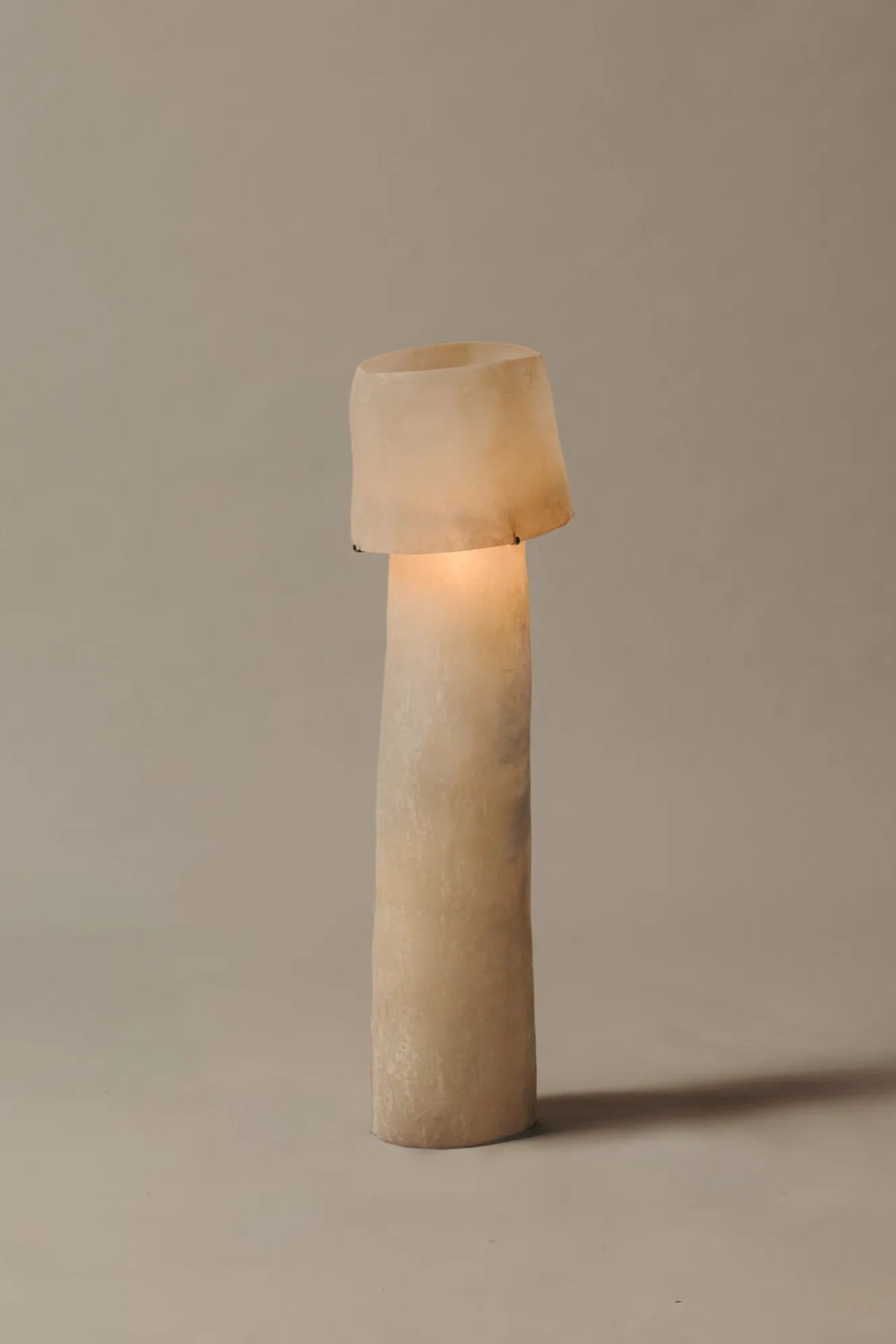 The ”Mush” Lamp (Tower) in a cozy bedroom setting