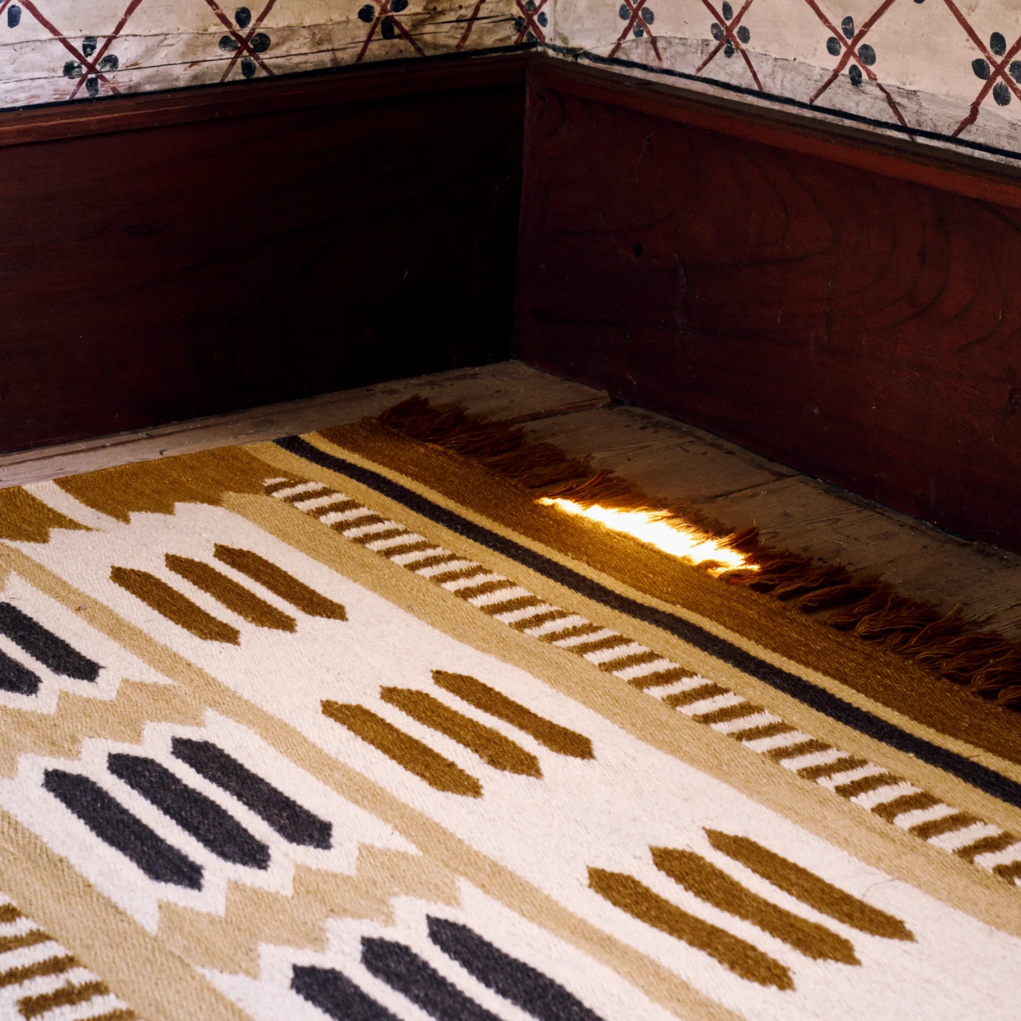 Hilma Wool Rug featuring a blend of warm earthy tones