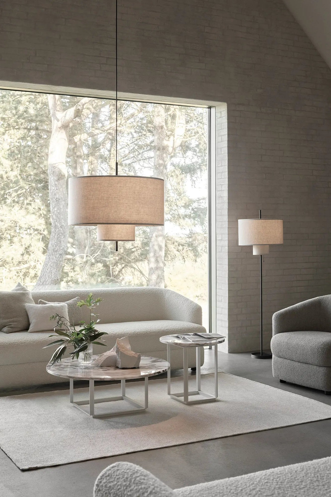 A close-up of the elegant design of the Margin Pendant Lamp with intricate metal details