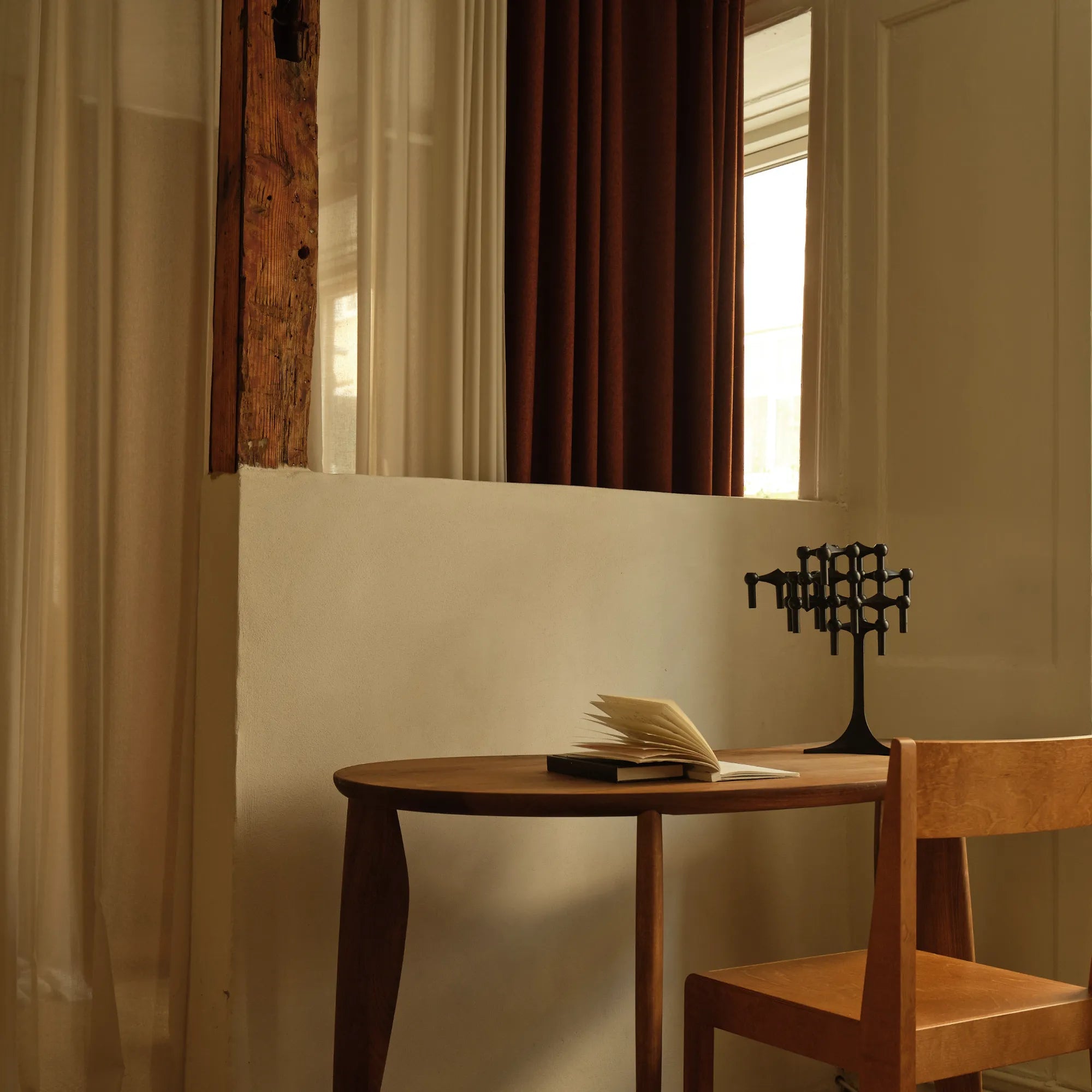 Collection of modular candle holders in black, showcasing the 4th configuration option