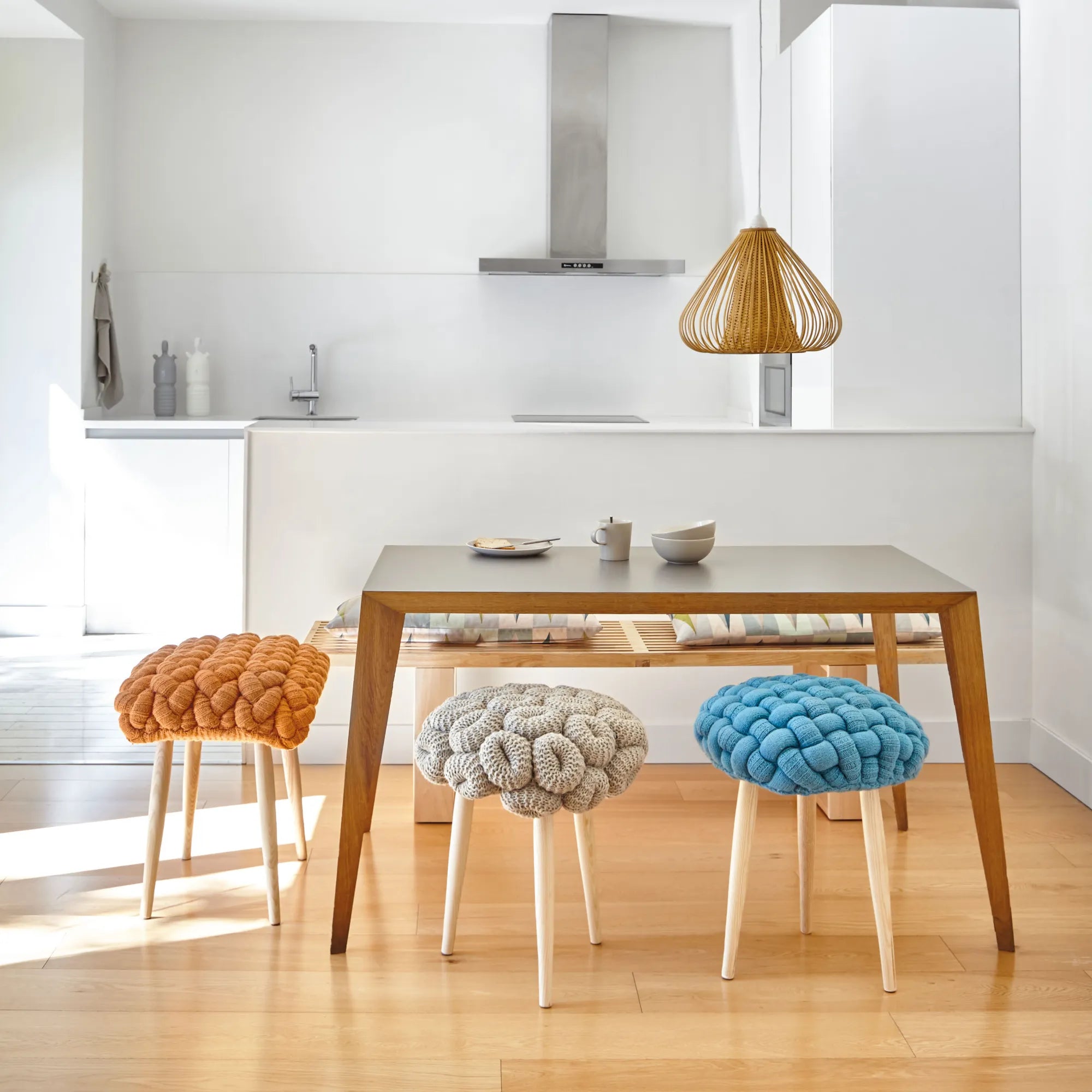 Handcrafted knitted stool made from natural materials in earthy tones