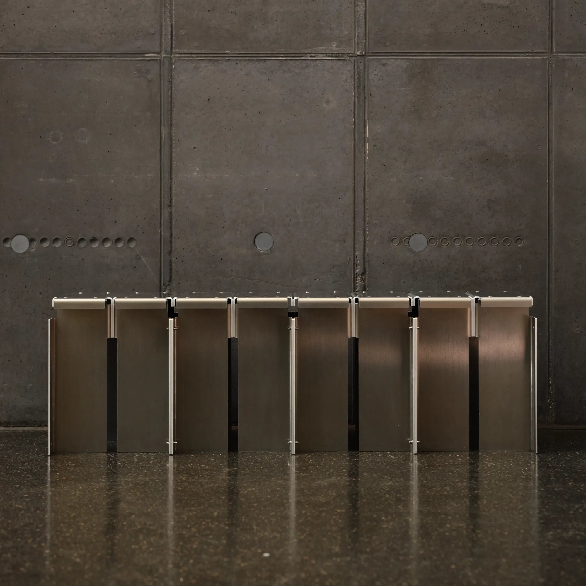  Segment Stool in a warm walnut finish, adding a touch of sophistication to any room