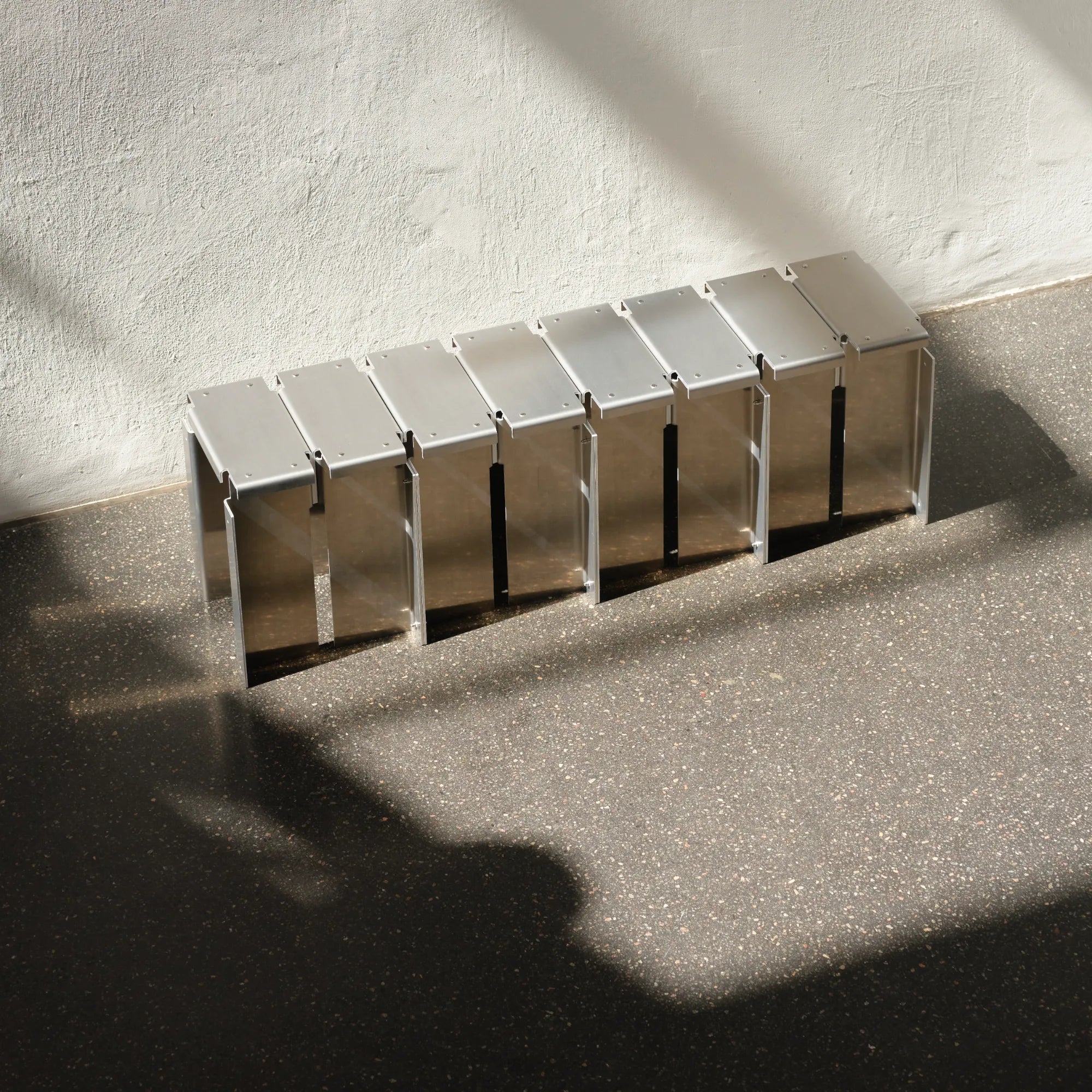  Detail shot of the comfortable padded seat and durable construction of the Segment Stool