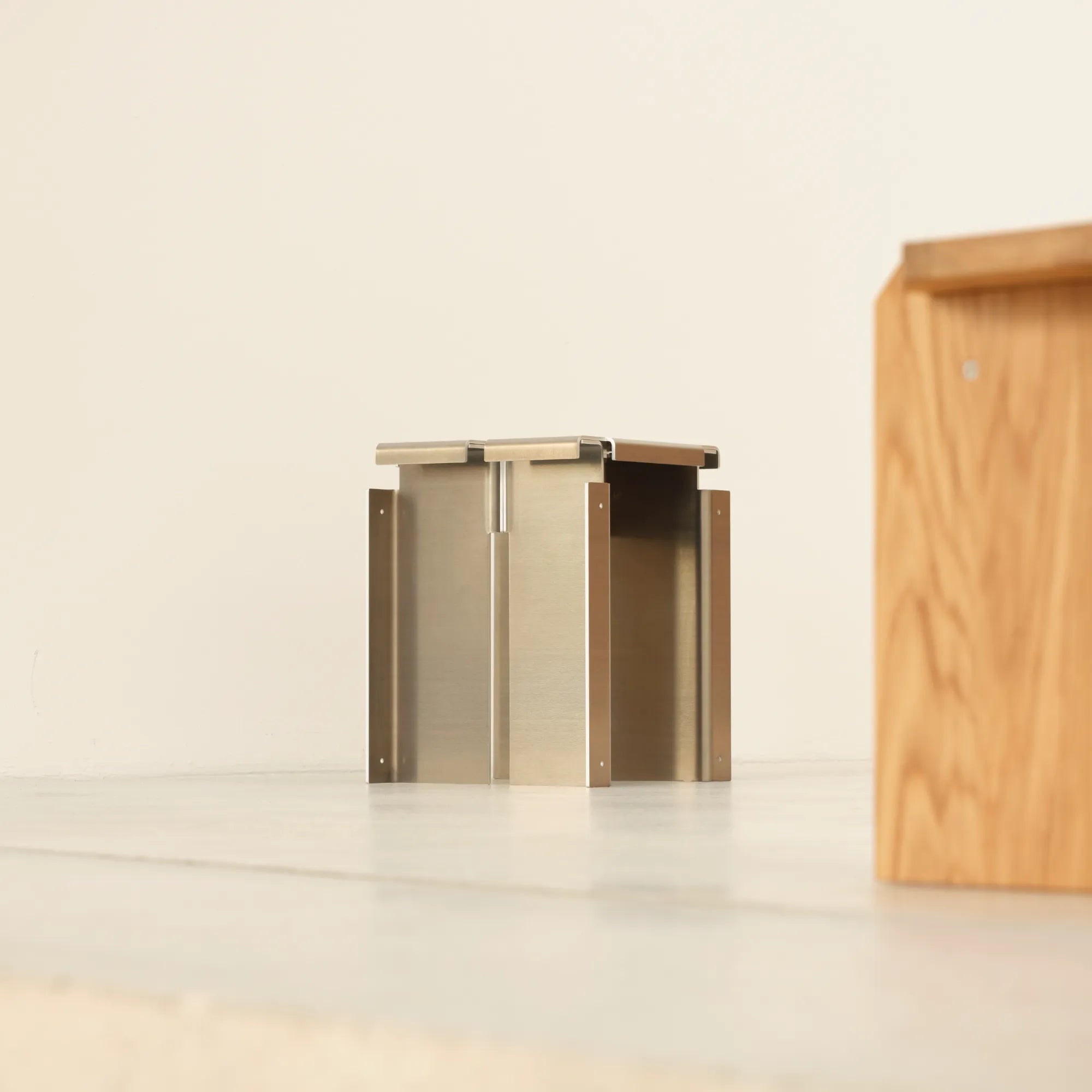  Segment Stool showcased as a functional and elegant addition to a kitchen island