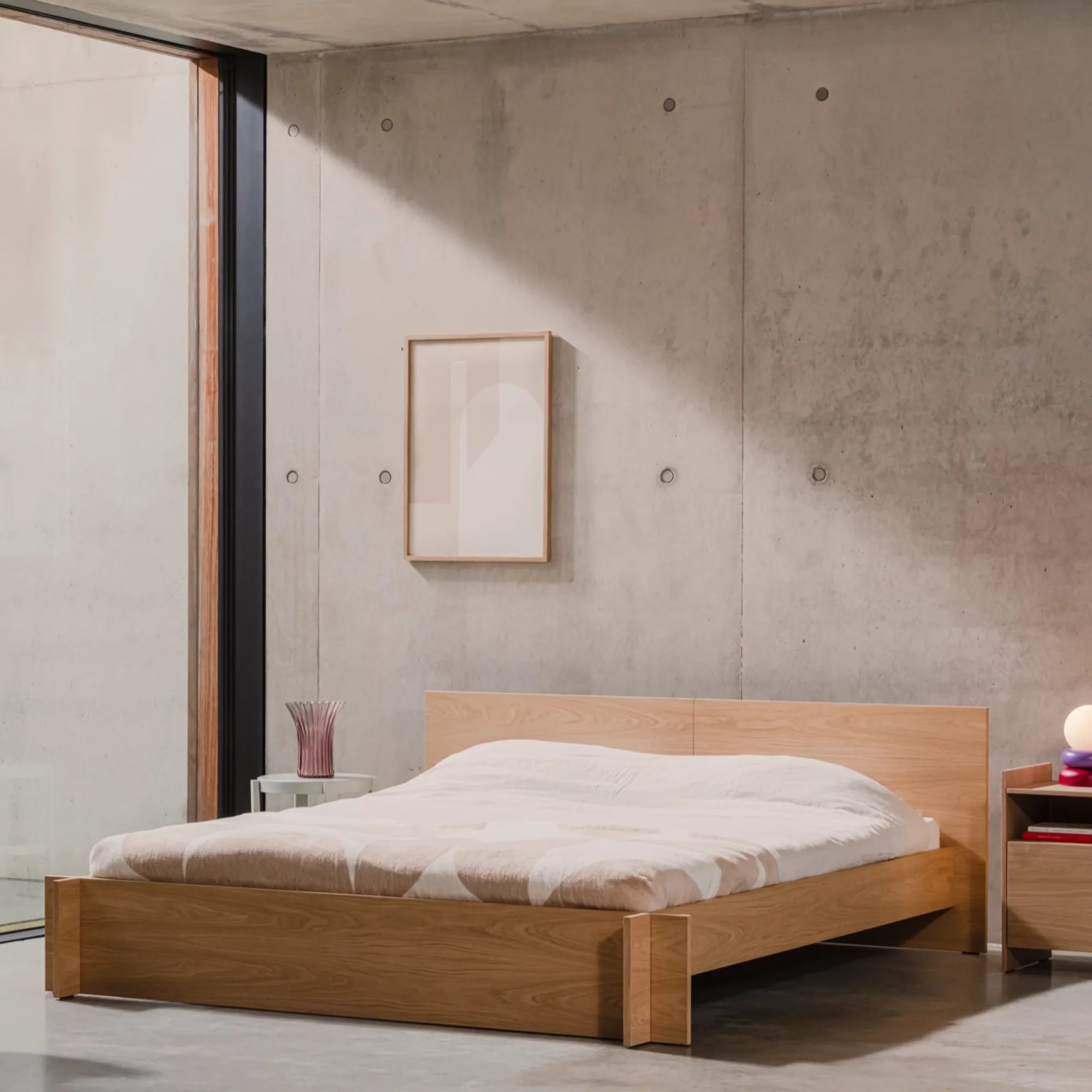 Modern wooden bed frame with upholstered headboard and sleek design