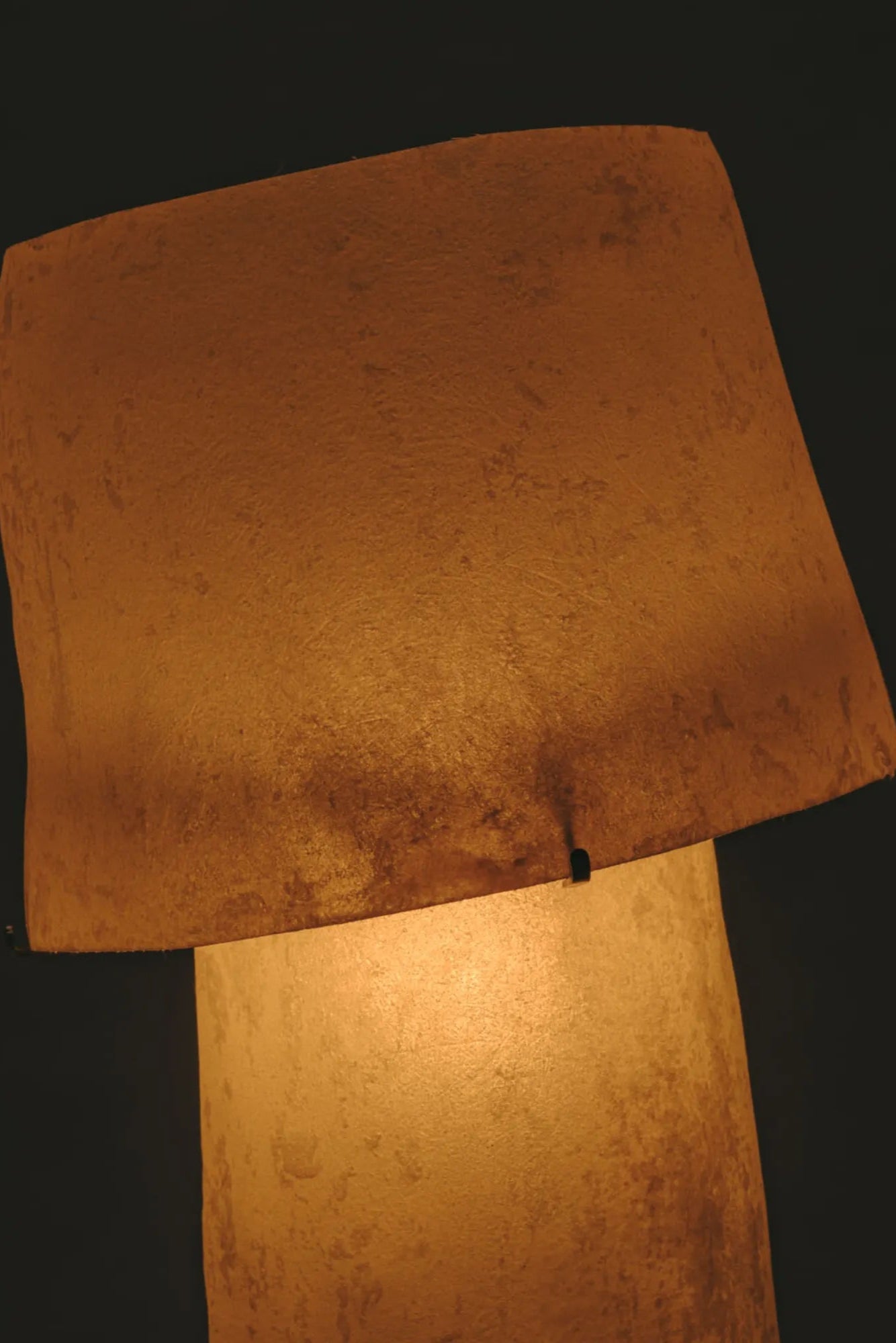 The ”Mush” Lamp (Tower) displayed on a sleek wooden table